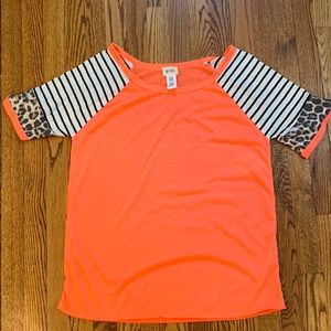 Neon coral tee with leopard on sleeve